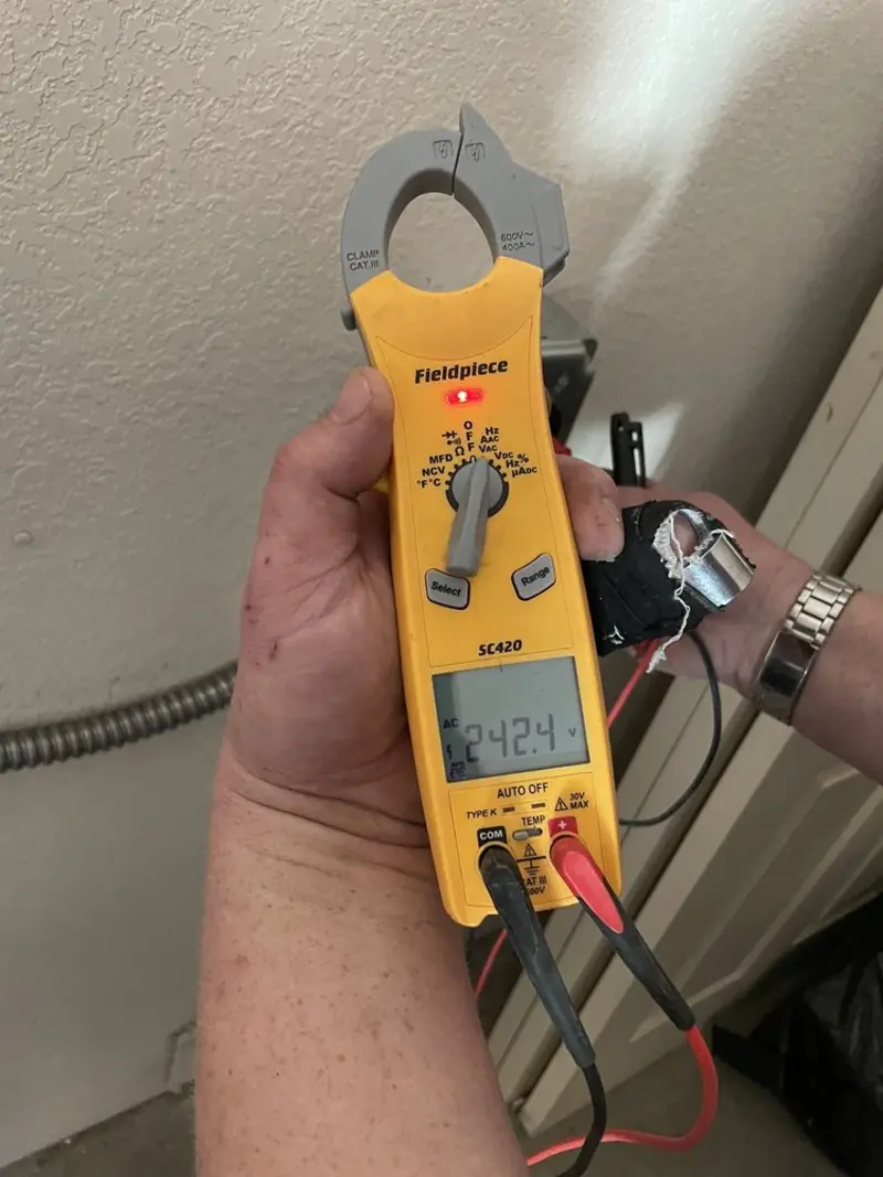 Voltage testing with clamp meter during Aluminum Wiring Replacement in Travilah